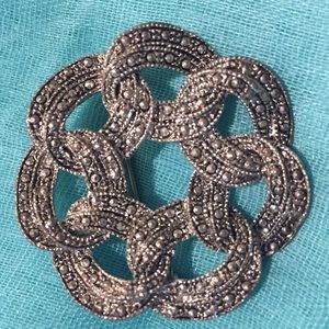 Hematite wreath design brooch
